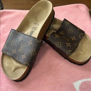 Birkenstock Monogram Print Slide Sandals in Brown and Tan